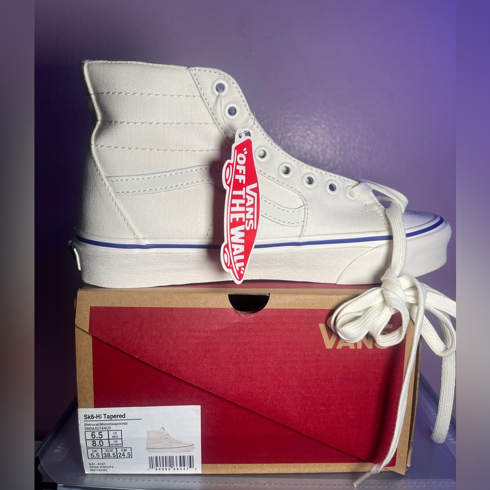 Brand new, never worn cream and and blue vans. Woman’s size 8.5.
